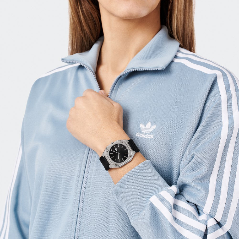 ساعة أديداس للرجال والنساء بحركة كوارتز ولون مينا أسود - ADS-0127