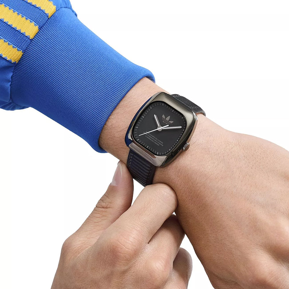 ساعة أديداس للرجال والنساء بحركة كوارتز ولون مينا أسود - ADS-0169