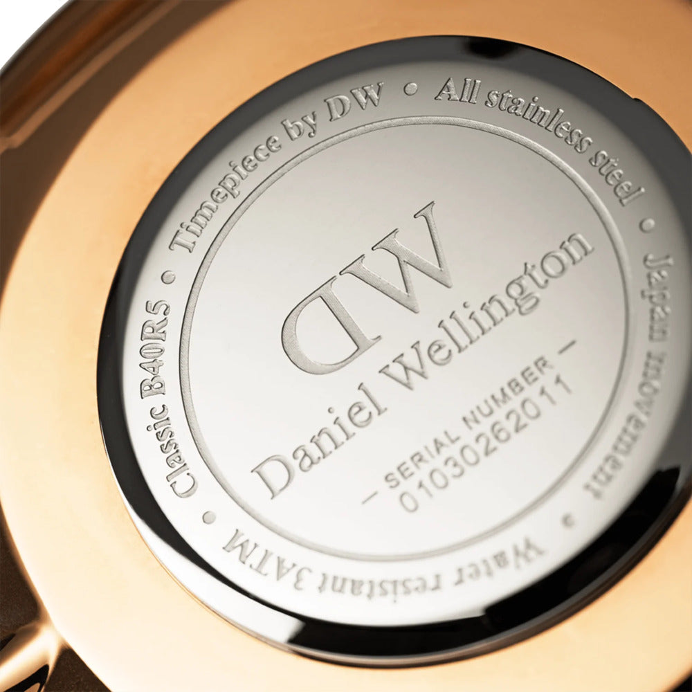 ساعة دانيال ولينغتون للرجال والنساء بحركة كوارتز ولون مينا أبيض - DW-1254