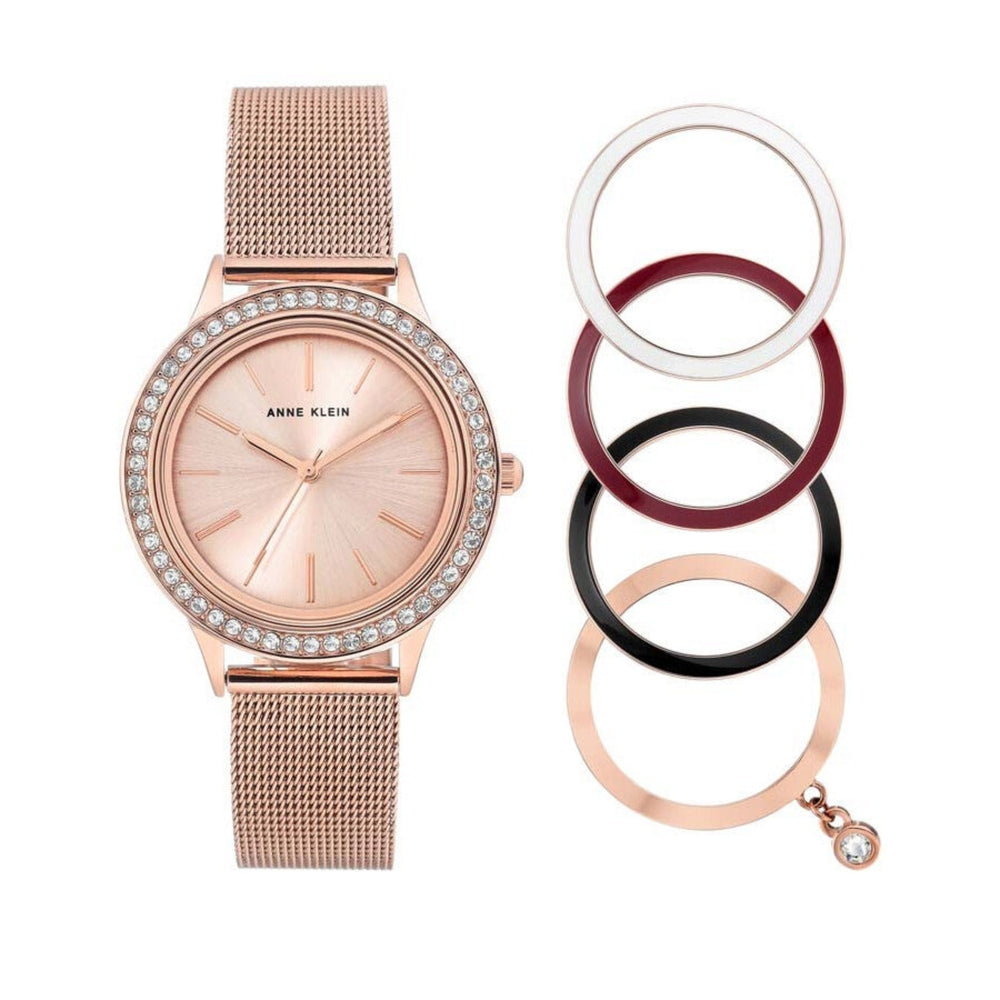 طقم آن كلاين النسائي بحركة كوارتز ولون مينا ذهبي وردي مع 4 إطارات تبديل - AK-0004+BEZEL RING 4PCS