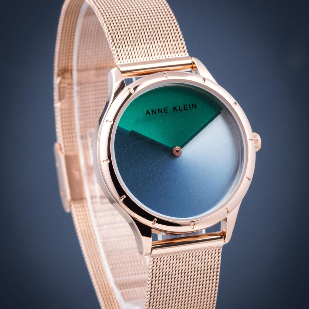 ساعة آن كلاين النسائية بحركة كوارتز ولون مينا أزرق مع أخضر - AK-0200